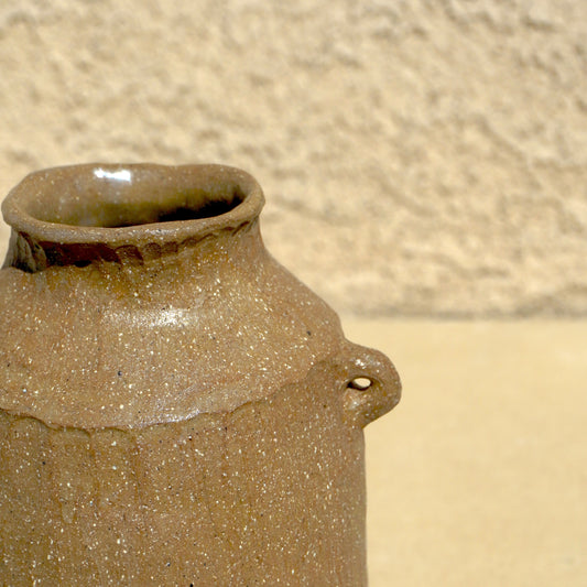 faceted rock clay vessel