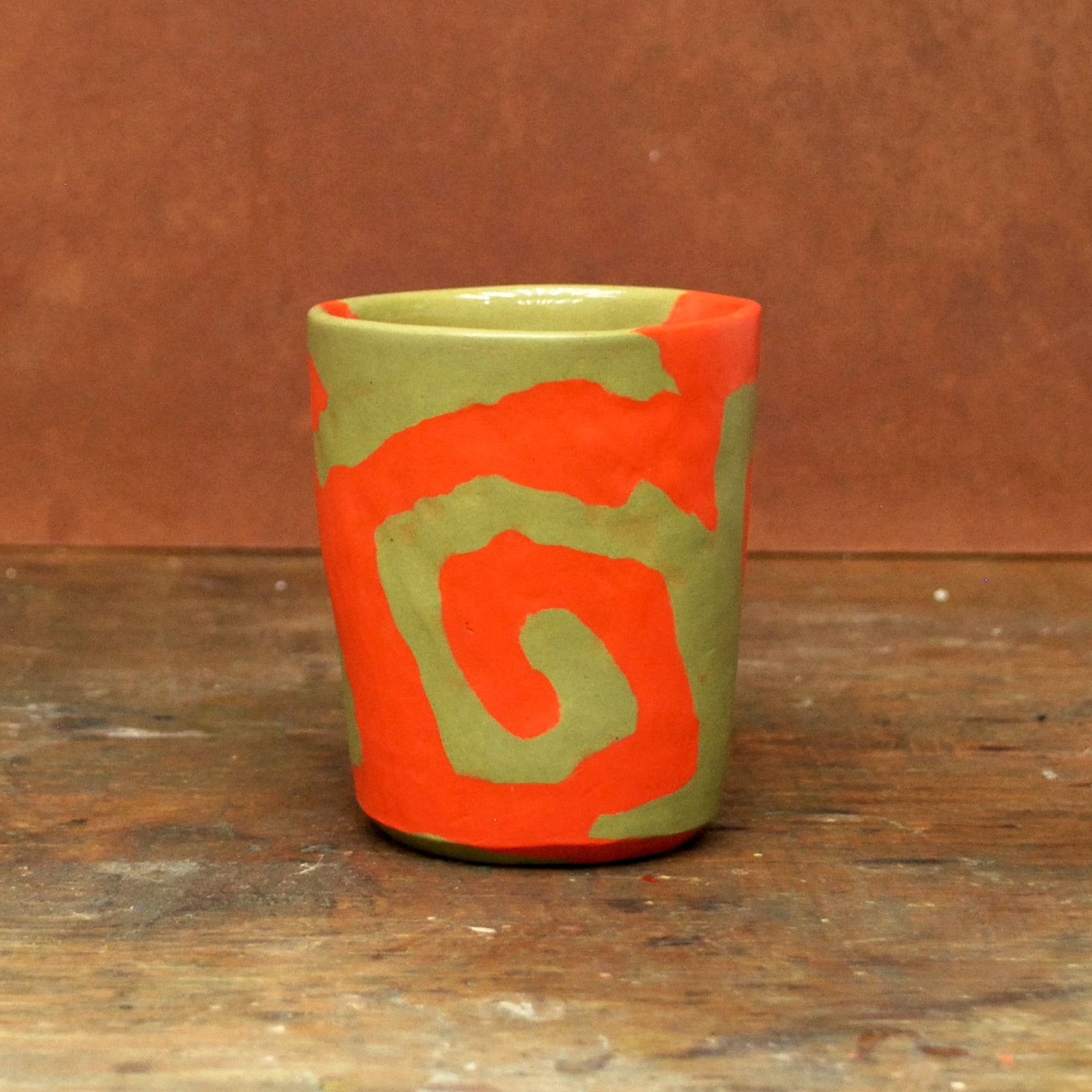 green & orange swirl