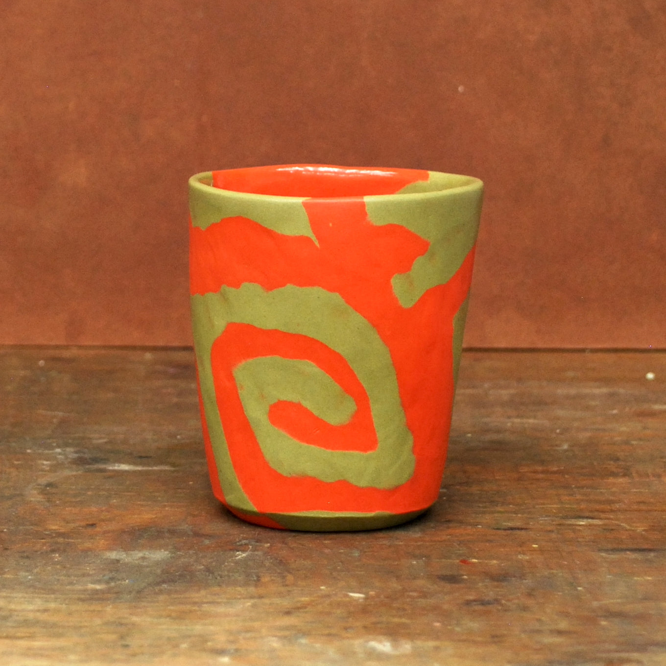 green & orange swirl