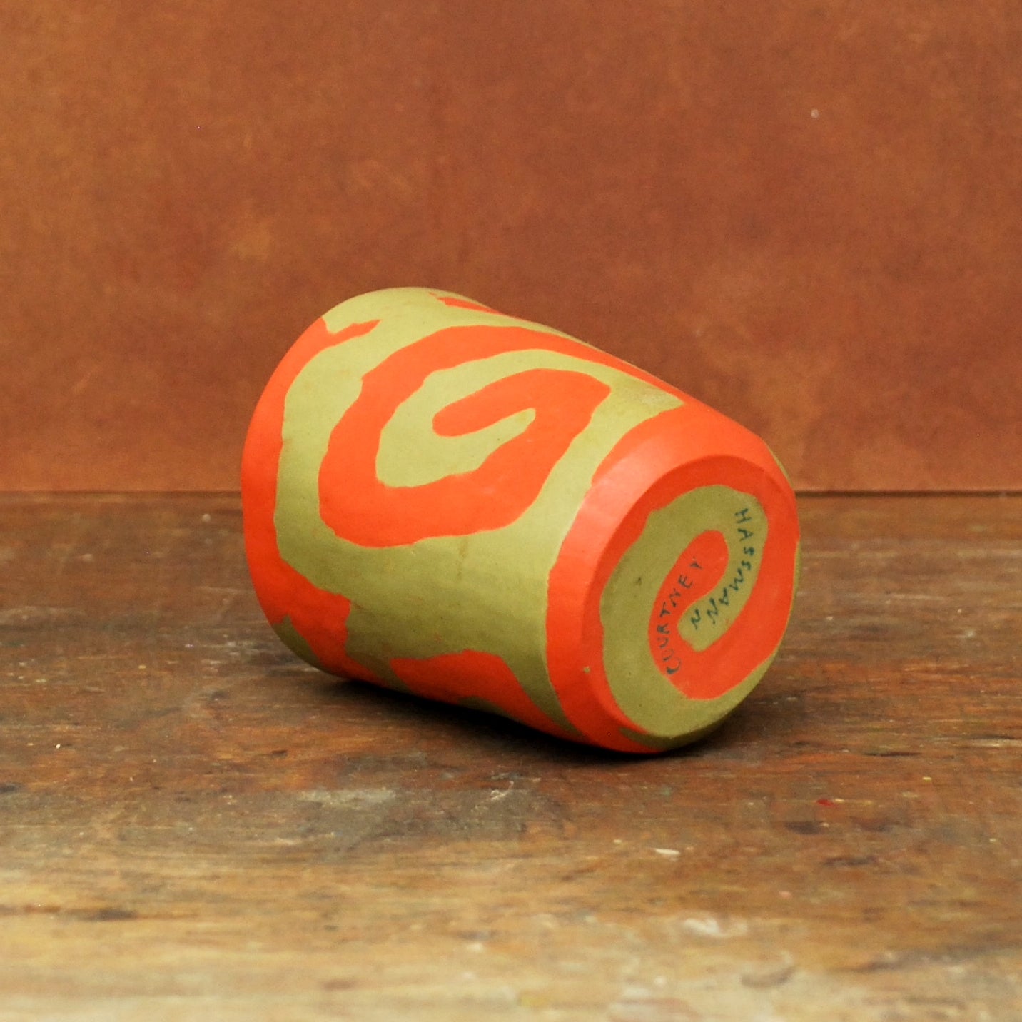 green & orange swirl