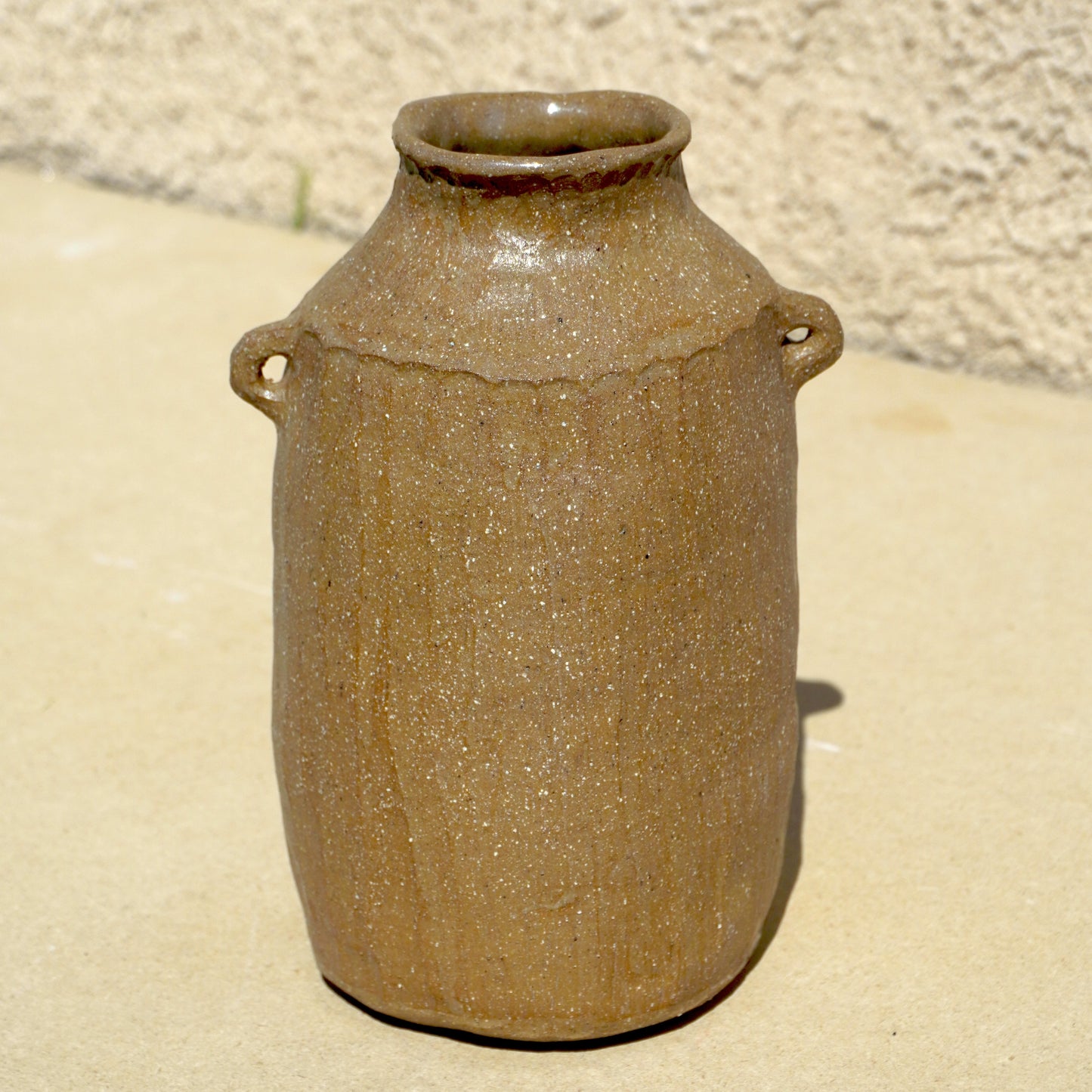 faceted rock clay vessel