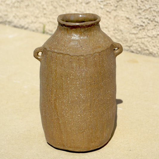 faceted rock clay vessel