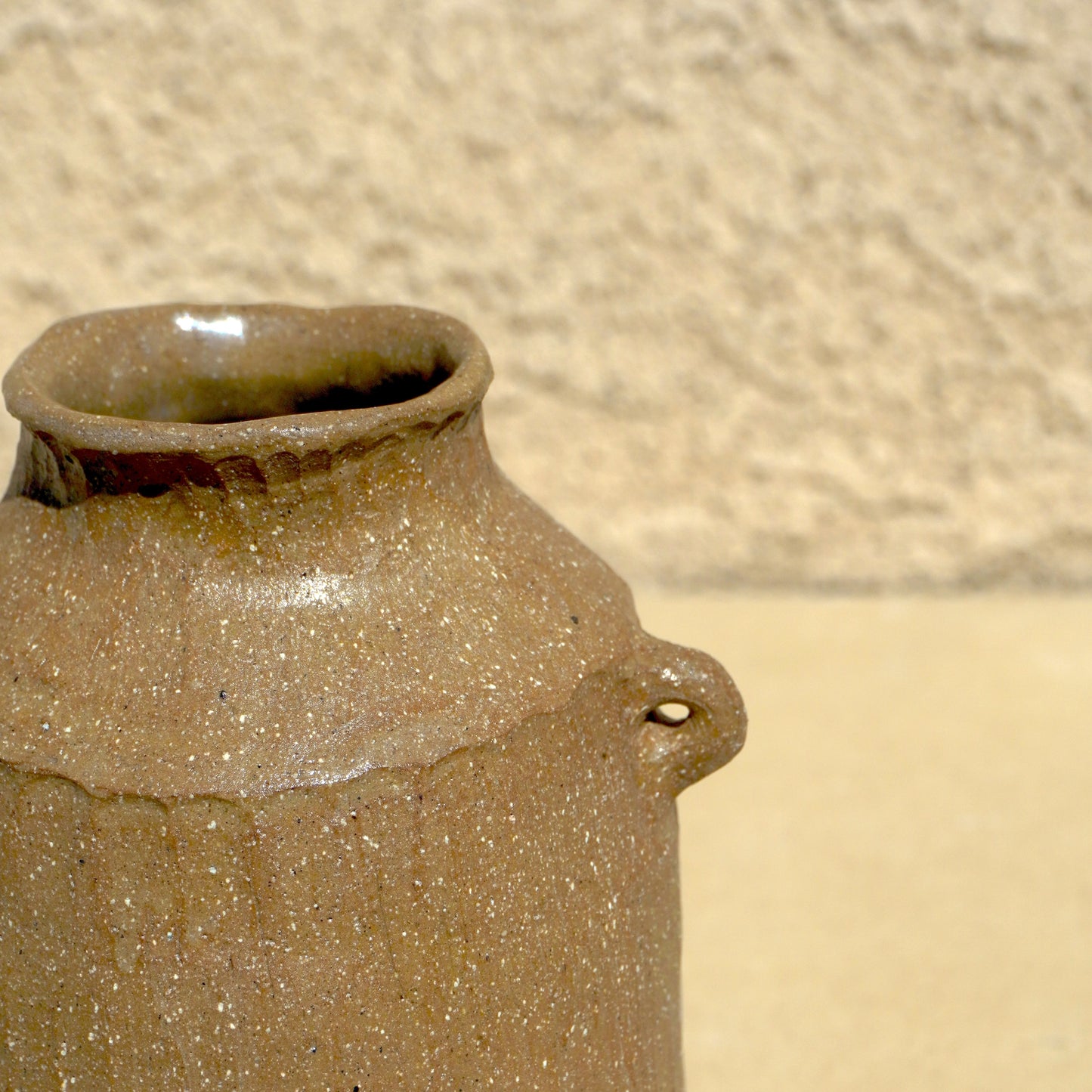 faceted rock clay vessel