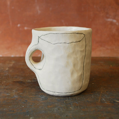 a drawing (a mug)
